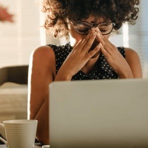 Woman dealing with stressful job and IV